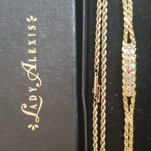 Lady Alexis ruby simulated diamond bracelet with matching necklace.